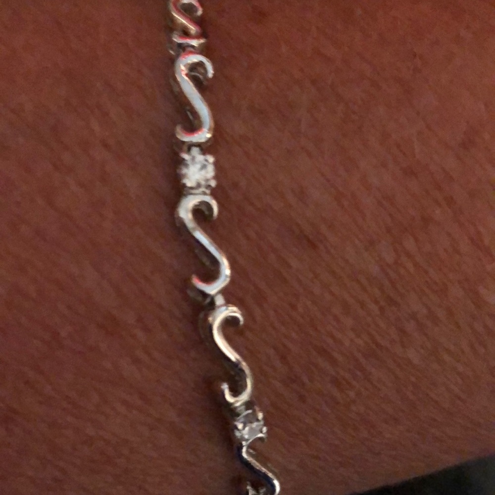 Sterling Silver w Diamond like Stone. Stamped 925